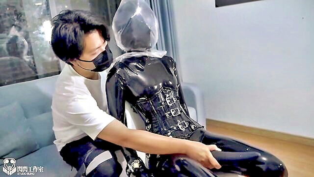 dominant fetish video features full body gel coat and latex headgear : Hardcore Punishments