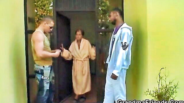 two younger men enjoy intimacy with an older woman in amateur video : Grandma Friends
