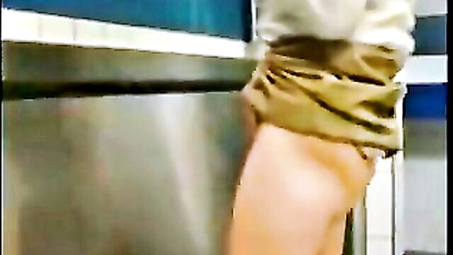 pissing, public, upskirt - voyeur captures woman urinating in public male restroom