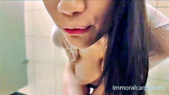 asian teen squirts during public bathroom solo session : webcam