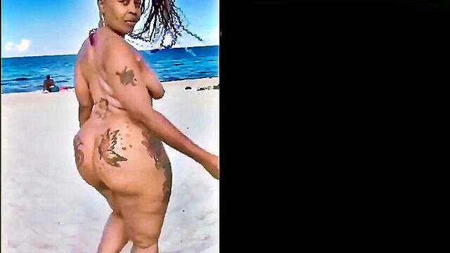 american, amateur, ebony - tattooed american ebony amateur showcases her big butt while strolling on a nude beach