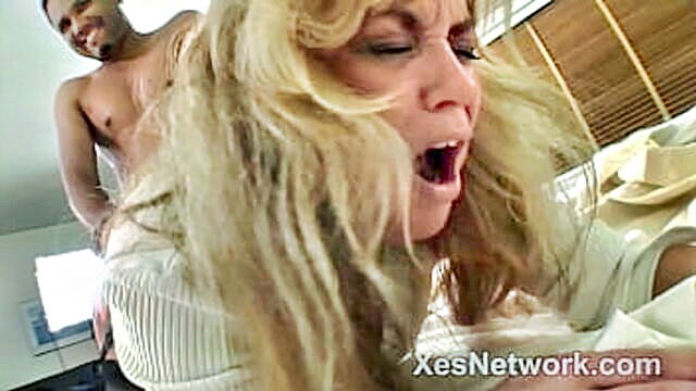 skinny blonde mature gives a blowjob and rides a big black dick in interracial scene : Xesnetwork