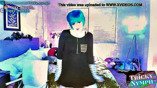 emo vixen with blue hair teases on camera showcasing her sexy charm and alluring assets : Pawg