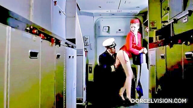Lucy Heart, Rhiannon Ryder - part 2 inflight seduction featuring airline stewardess in nylon stockings