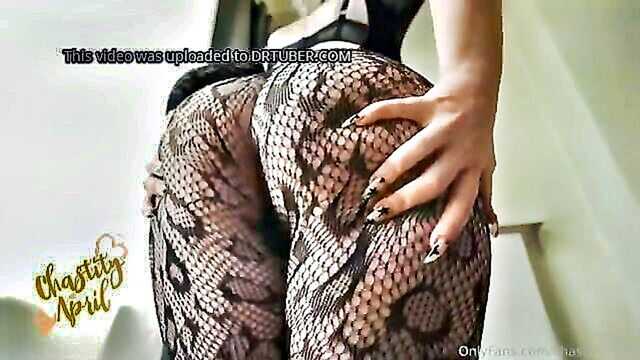 April - experience the captivating charm of chastity april a mysterious and soft femdom milf in alluring lingerie indulging in some naughty solo play with her round tantalizing ass