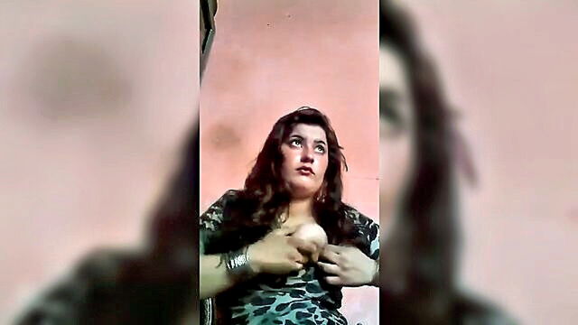 redhead, softcore, big tits - a pakistani girl from pathani showcases all of her attributes in a solo webcam performance