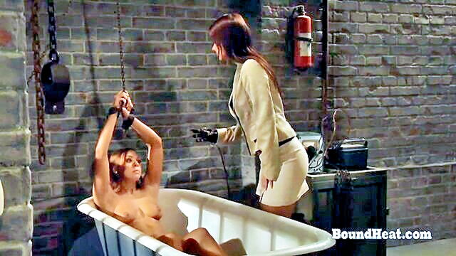 bdsm play involving spanking and electrode stimulation for a lesbian submissive : Bound Heat