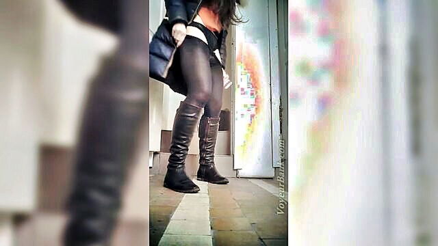 white woman in black boots and pantyhose urinates in restroom : Voyeur Bank