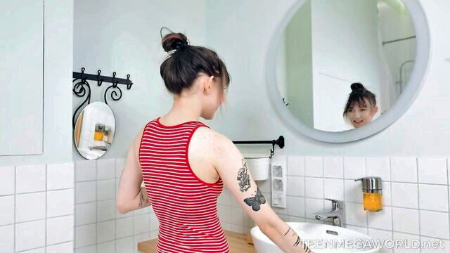 see how this beautiful woman enjoys the shower and her desires for female genitals : TeenMegaWorld
