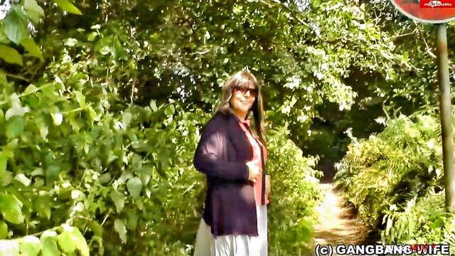 Gangbang-Wife - a wife has a gang bang experience with several men and has her breasts and vagina stimulated in a pov style on the autobahn rastplatz