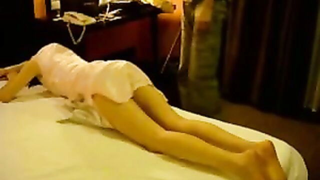 on her, brunette wife, her ass - spanking her ass while she lies on her belly