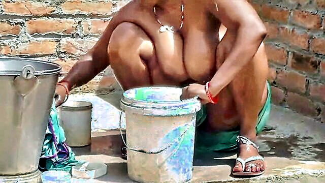 a young and attractive indian housewifes intimate moment with soap on her roof : Ragini