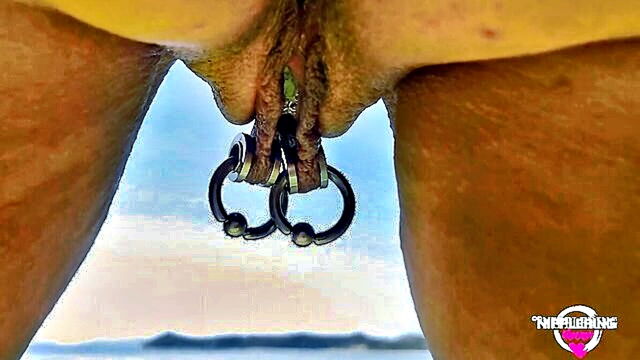 extreme pierced nipples and pissing at a public beach in faphouse video : FapHouse
