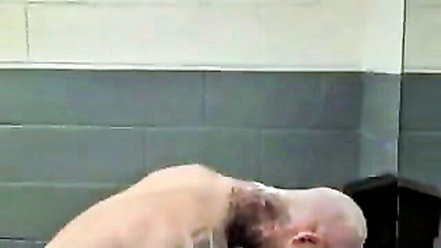 headshave, tatted, razor - tattooed showdown in restroom