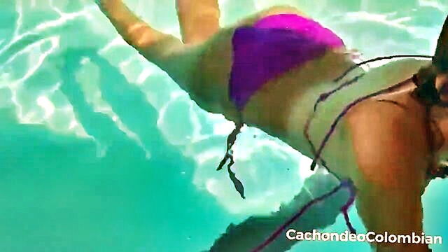 offering cash to a skinny latina as she swims in the pool : waelchi_lottie