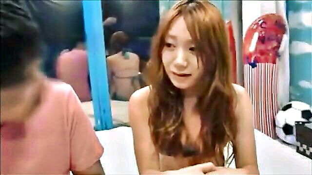 amateur asian beauties in a steamy encounter inside a glass room : helene07