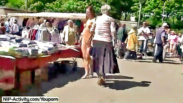 a german lassie enjoys public street playtime : mills_jena