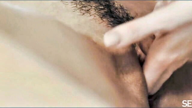 milan cheek - lesbian intimacy with curly hair