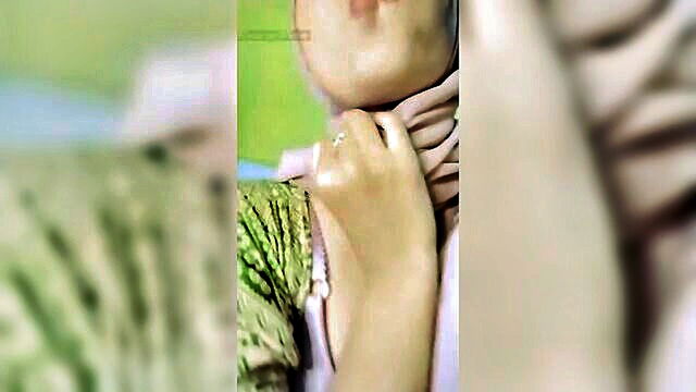 big tits, ebony, amateur - hijab wearing indonesian girl goes wild in steamy video