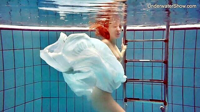 russian teen swims in the pool without a swimsuit : Underwater Show