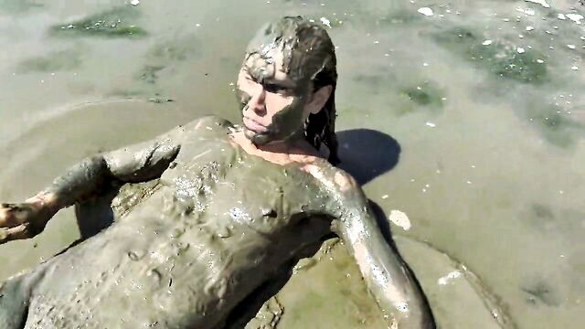 nude girl in the mud