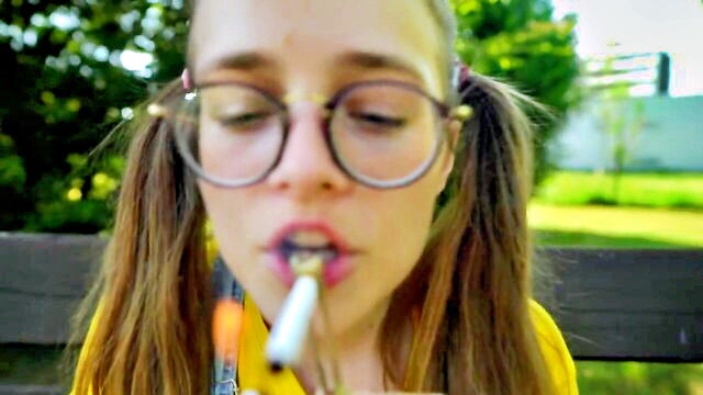 cowsik - nerdy glasses trying to smoke