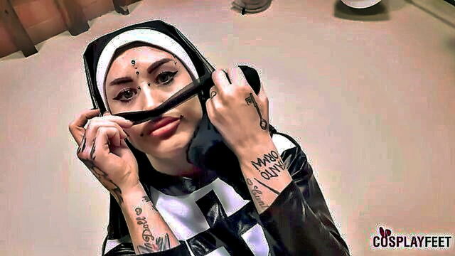 tattooed brunette in pantyhose and heels indulges in foot fetish : Cosplay Feet