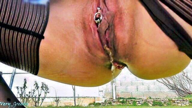 French mom squats pussy in garden