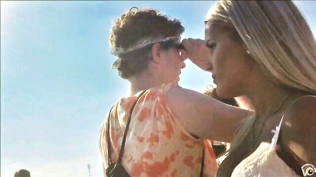 walks, blonde, honey - scantly clad beach walker