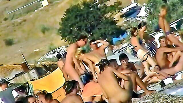 naughty beach bather caught on phone near water : lhermann