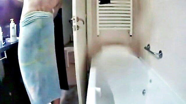a steamy shower with a voyeuristic twist a man and woman caught on hidden camera : volkman_alberto